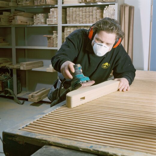 Luke planing the York garden bench arm