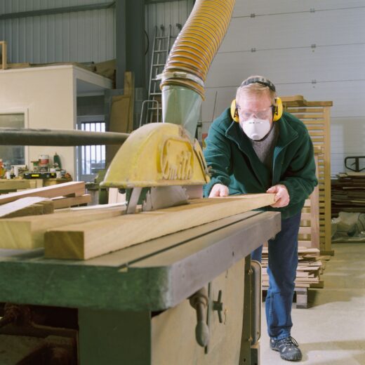 Mike Davidson cutting wood ready for bench assembly