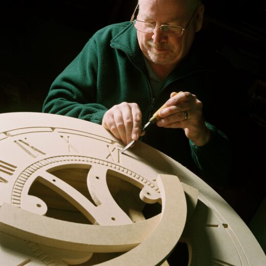 Engraving Roman Numerals on a wooden clock face