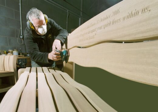 Garry planing a wooden bench