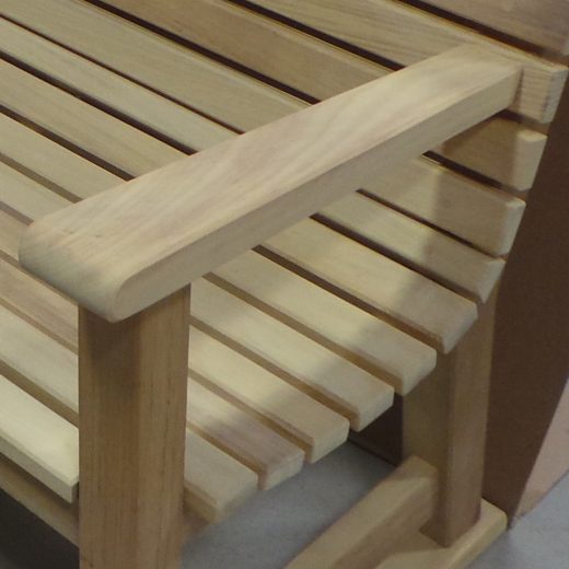 Close up of the Regent wooden seat slats and arm rest