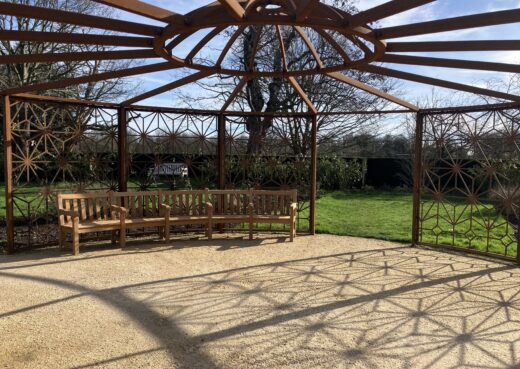 The York curved bench under the Pergola at the Rose Garden, Greenwich Park