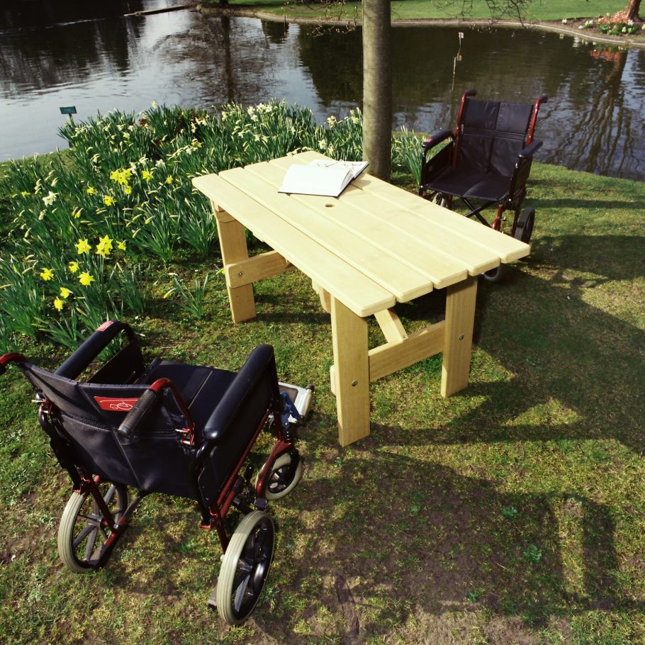 Bespoke garden table constructed at a height to allow for wheel chairs