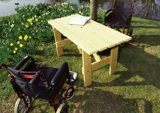 Bespoke garden table constructed at a height to allow for wheel chairs