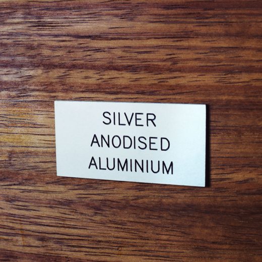 Silver anodised aluminium badge