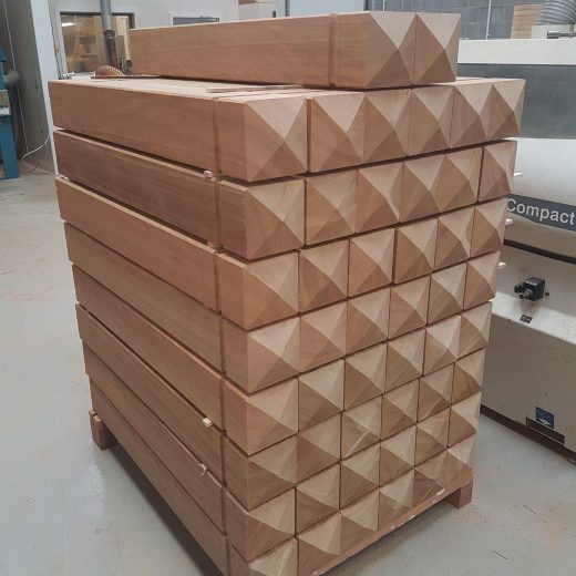 Stacked timber bollards ready for dispatch