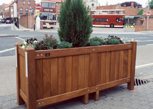 Large roadside wooden planter
