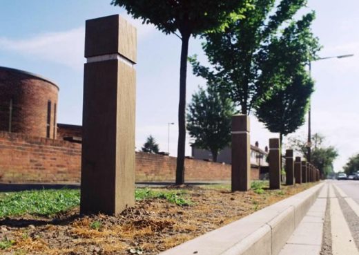 Roadside timber bollards with reflective strips